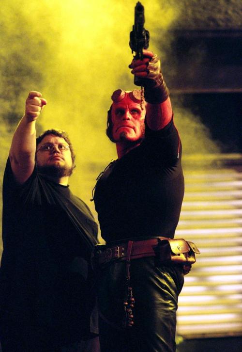 auteurstearoom:Director Guillermo Del Toro gives direction to Ron Perlman on the set of Hellboy.