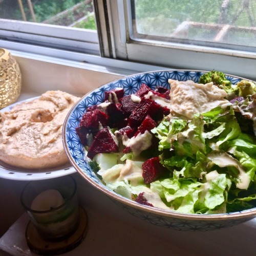 Lunch! Salad with roasted beets &amp; broccoli, topped with tahini and hummus Also half a whole whe