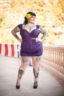 lovethembigandthick:  tattooeddesire87:  jwoodall1986:  Who is this woman?   She’s Gorgeous!  I love a tattooed cutie