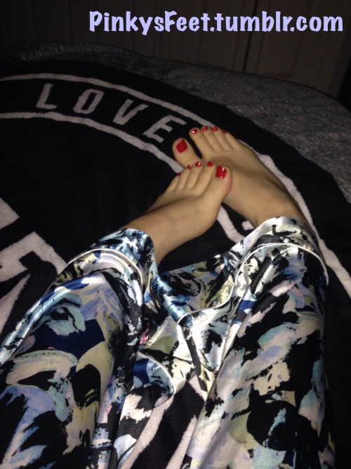 pinkysfeet: My bed and my red toes.