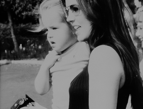 Priscilla and Lisa Marie Presley at Disneyland, c. 1970.