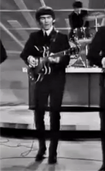 harrisonstories:  “George was wonderful on the guitar. His little legs would kick