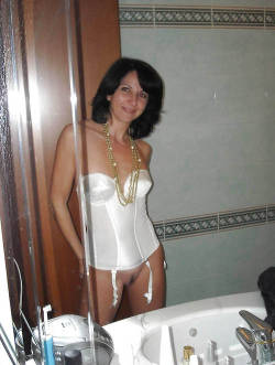 arousingrealwomen:  lingerieamateurs:  Hot mom in satin bustier  Sexy amateur in white bustier shows pussy  