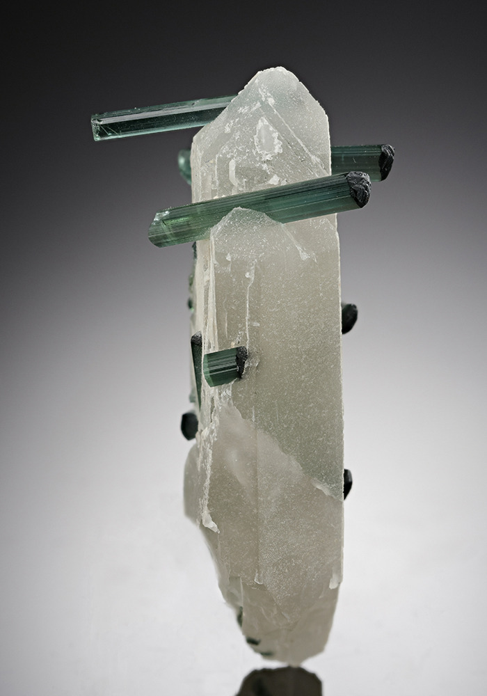 hematitehearts:  White Quartz with Penetrating Blue Green TourmalineLocality:  Manoel