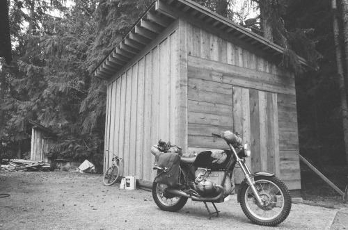 cabinporn:  James Crowe, who together with Jordan Hufnagel, runs motorcycle & camp brand West America sent us some pics of his machine shop in Whistler, British Columbia built mostly from salvaged materials for less than a grand. More here. 