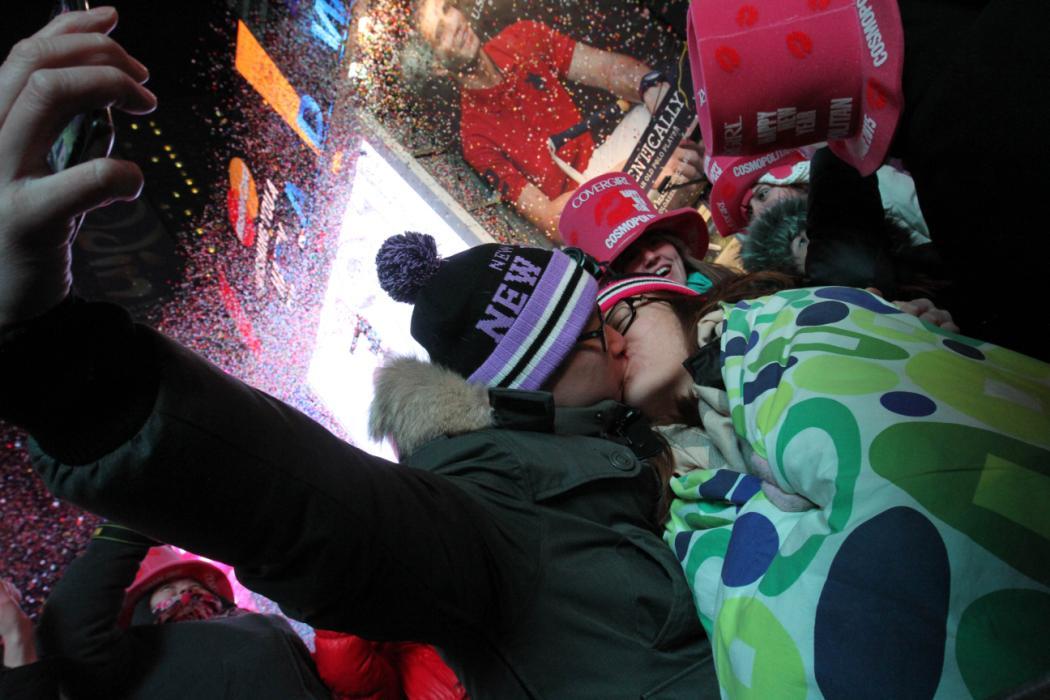 yahoonewsphotos:  2014 New Year’s Eve in NYC’s Times Square Since 1907, people