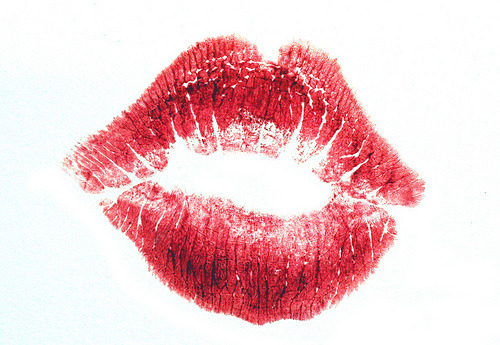 Puckered kiss lips