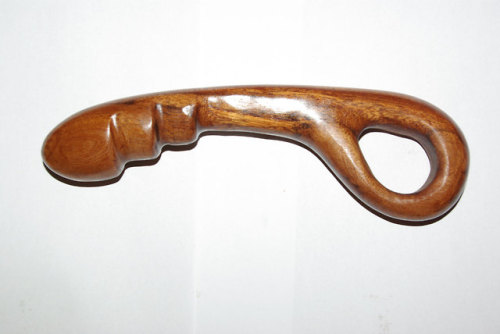 Wooden ribbed dildo with finger hole