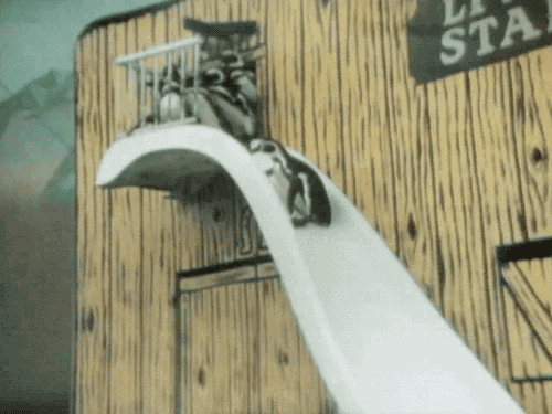 gameraboy:  Having a bad day? Please enjoy these penguins on a water slide! 