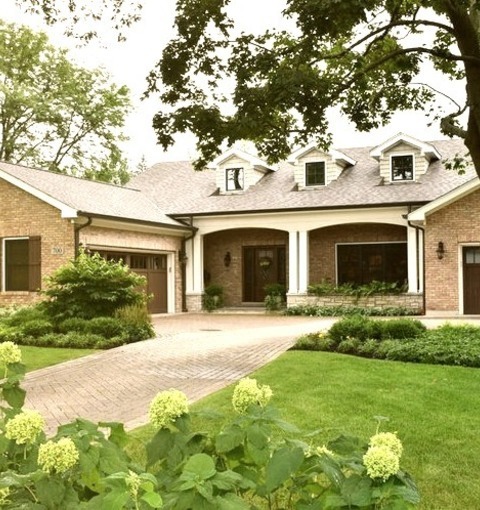 Front Yard Concrete PaversSummertime Concrete Paver Landscaping Design Ideas For A Medium-sized Traditional