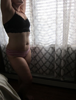thehillshavethickthighs:  Stretching by the bedroom window. 