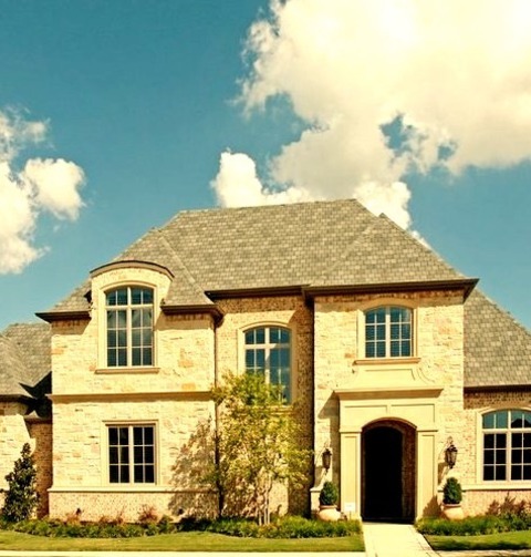 Traditional Exterior - StoneInspiration For A Mid-sized Timeless Beige Two-story Stone Exterior Home