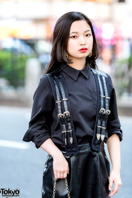 20-year-old Japanese student Natsumi wearing a collared Moussy top with a leather suspender skirt by