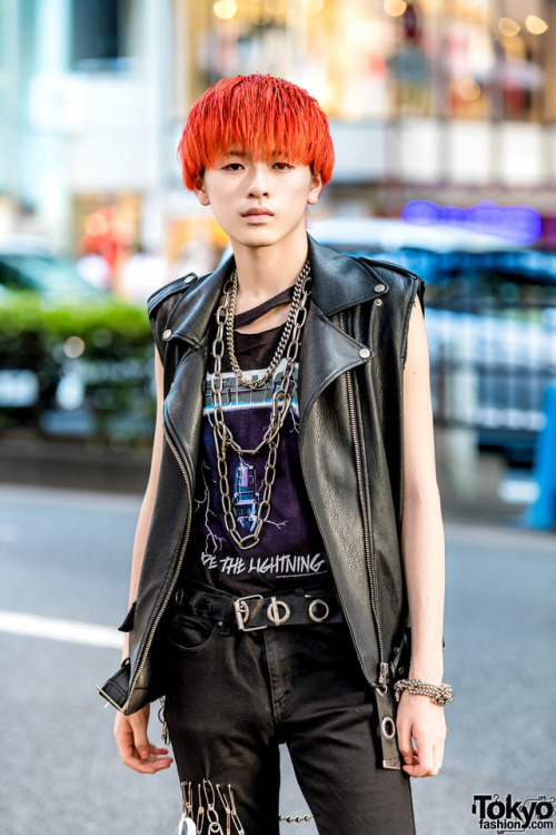 20-year-old Japanese student Kanade on the street in Harajuku wearing a DIY punk leather vest over a