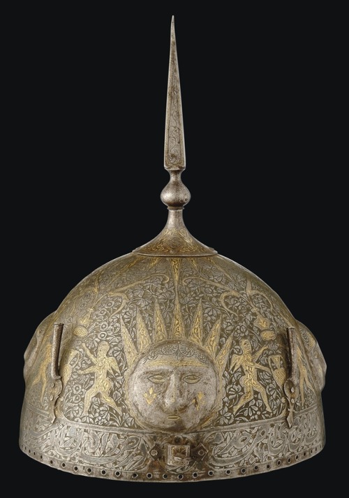 Gold and silver damascened helmet, Persia, 19th century.from Christies