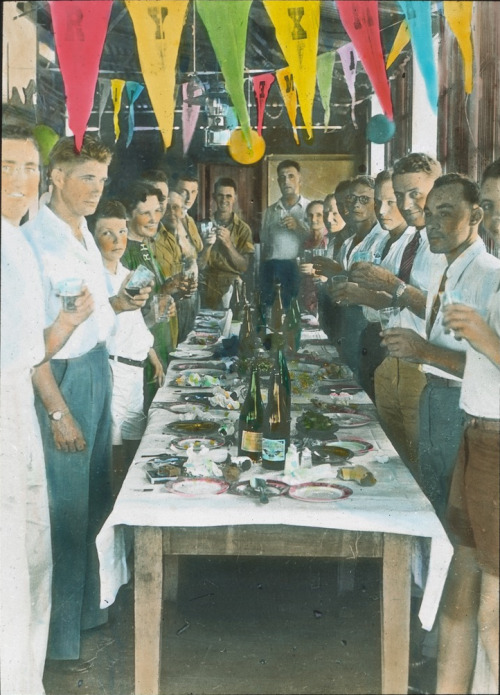 Title: Unidentified group of people proposing a toast after Christmas lunch [transparency] : scenes 