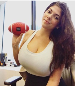 funbaggery:  Emily at work. 😳🍼🍼🏈