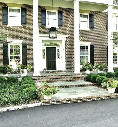 DC Metro Natural Stone PaversAn Example Of A Large Traditional Full Sun Front Yard Stone Landscaping