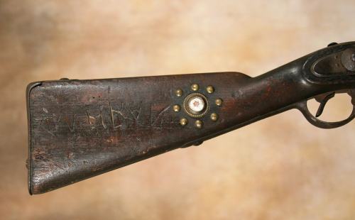 An Austrian Lorenz percussion musket which has been tack decorated and sawn down into a &ldquo;b