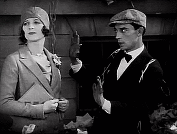 Buster Keaton prepares to take a tintype of Marceline Day in The Cameraman (1928)