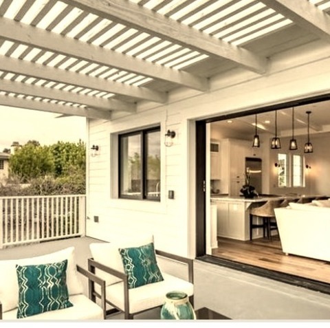 Beach Style Deck - PergolasLarge Beach Style Backyard Picture Of A Deck With Wood Railings On The Second