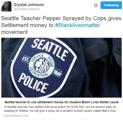 fatcrybabie: curlypothead:  ghettablasta:  Seattle teacher Jesse Hagopian was on his way home during Martin Luther King Jr. Day 2015. After he gave his speech he called his mother while crossing the street when the police officer Sandra DeLaFuente pepper