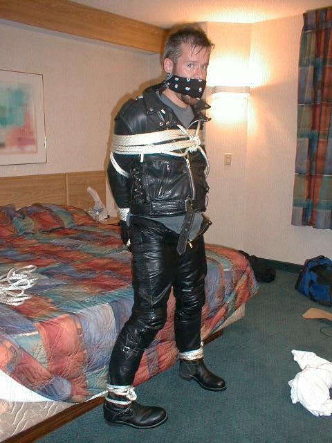 bubbabrando:  jhardcastle1976:  The best way to keep a guy in a leather biker jacket, tied up and his big mouth gagged  yes, it was quite effective. 