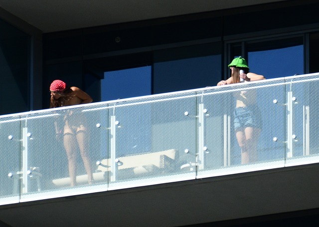 Saw these 2 girls way up at the Cosmo. Why is it the dude has clear glass and the