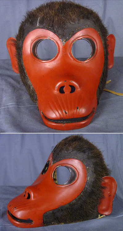 Saru Monkey Mempo. 18th Century, Momoyama-Edo PeriodA unique red lacquered Iron Monkey faced Menpo w