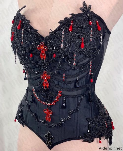 Rib Cage corset in Red: a dupioni silk and satin corset with fabric ribcage appliqué and hand embro