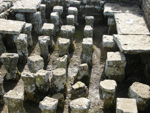 The hypocaust was an empty space that existed under the floor of certain rooms in ancient Roman bath