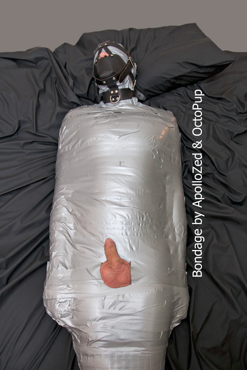 apollozed:FetishLA mummified. Duct tape on body and vinyl tape on head. Assistance