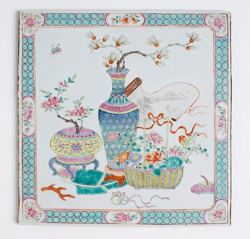 Tile decorated with flowers of the four seasons, and emblems of the scholar. Qing dynasty 1644-1911,