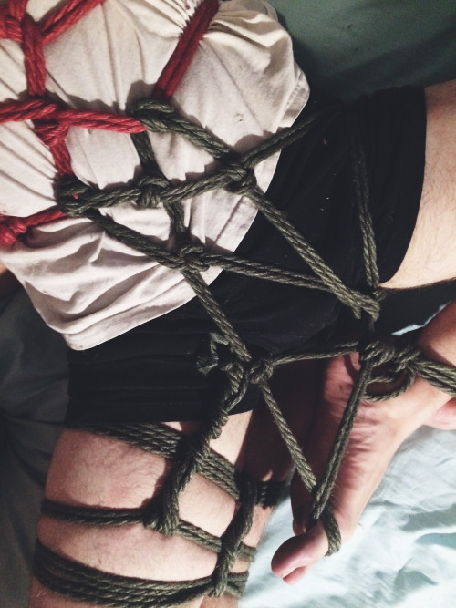 camdamage:  messy sweaty (and dimly lit) rope practice tonight with the cuttlefish [with red and green jute from @theropegeek - i call it “the Krueger kit”] 