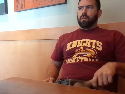 queerclick:  Watch this daredevil otter wank off whilst watching porn in a cafe!! Watch free video here.