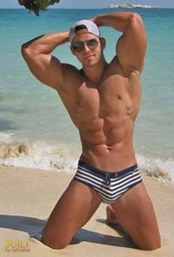 glad2bhere:  http://glad2bhere.tumblr.com/archive       love a good looking muscle man in a bulging striped speedo …. built by tall steve …