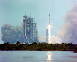 for-all-mankind:  The last Saturn V rocket launches the Skylab space station, 14 May, 1973, while the rocket that will launch its first crew, Skylab 2, is in the foreground. 