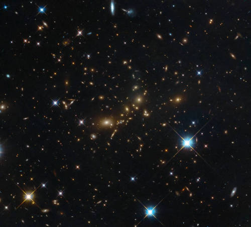 A galaxy cluster, or cluster of galaxies, is a structure that consists of anywhere from hundreds to 