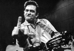 fvckhxpe:  Lucky to share a birthday w/ the Man in Black. Happy birthday Johnny Cash