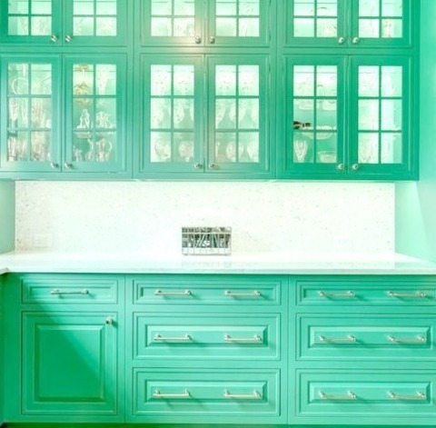 U-Shape - Eclectic Home BarAn Illustration Of A Sizable Eclectic Wet Bar With Green Cabinets And A White