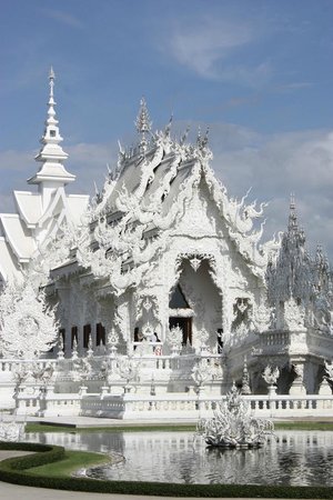 madeleineengland:  Wat Rong Khun, better known to foreigners as the White Temple,