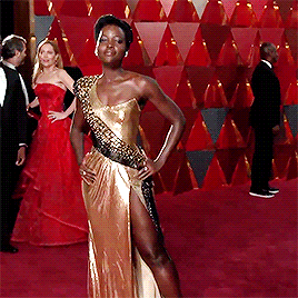 calebholoways:Actress Lupita Nyong’o arrives at the red carpet for the 90th Annual Academy Awards on