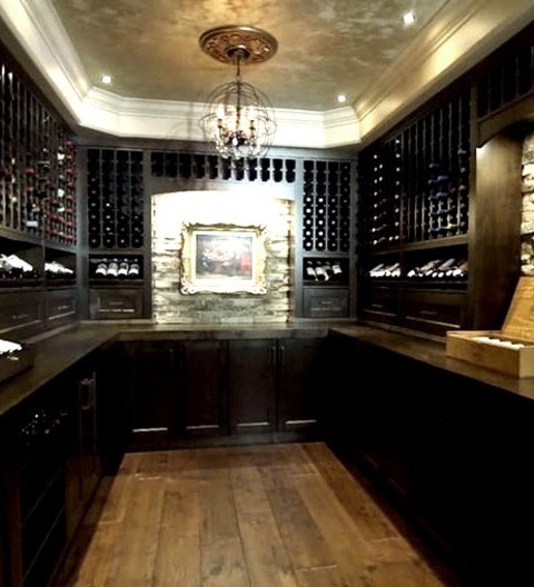 Traditional Wine CellarLarge Traditional Wine Cellar With Display Racks And A Medium-toned Wood Floor.
