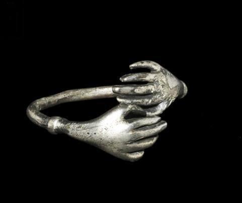 archaicwonder:Medieval Silver Hands Ring, 13th-16th centuryA round-section penannular hoop with bulb