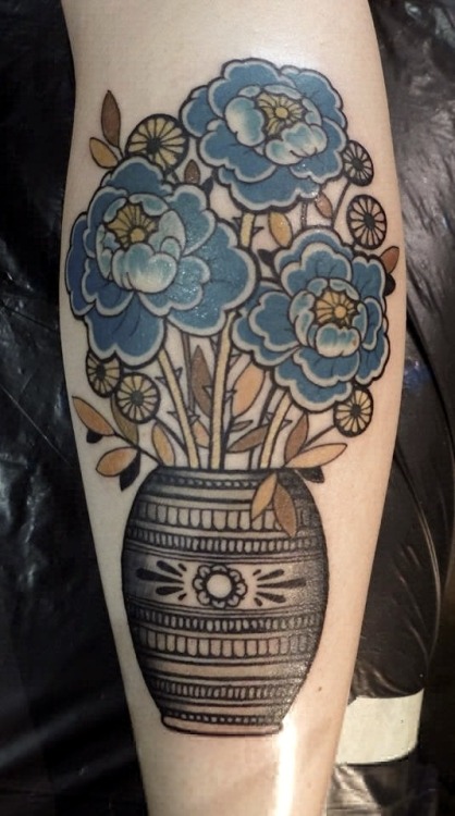 blue flowers tattoo