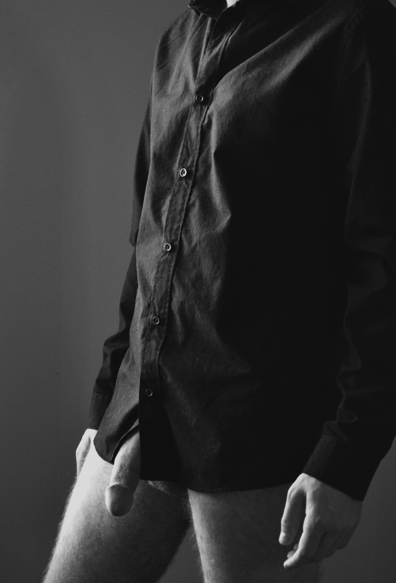 percentage69:  Dress shirt and a bland pose.