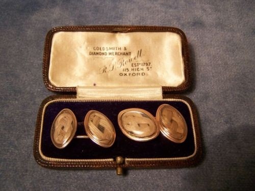 Late 1800s gold plated mourning hair cuff link set. Note: Do not wear on first
