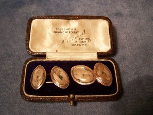 Late 1800s gold plated mourning hair cuff link set. Note: Do not wear on first date.