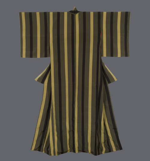 Title: Striped kimonoDate: 1950sDescription:A silk kimono featuring broad vertical omeshi-woven stri