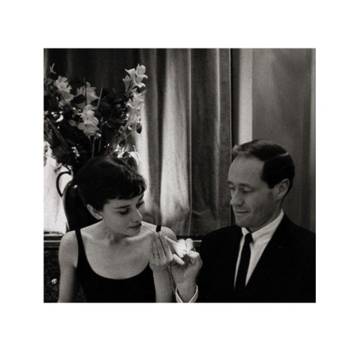 Audrey Hepburn & Mel Ferrer in Paris, 1955.